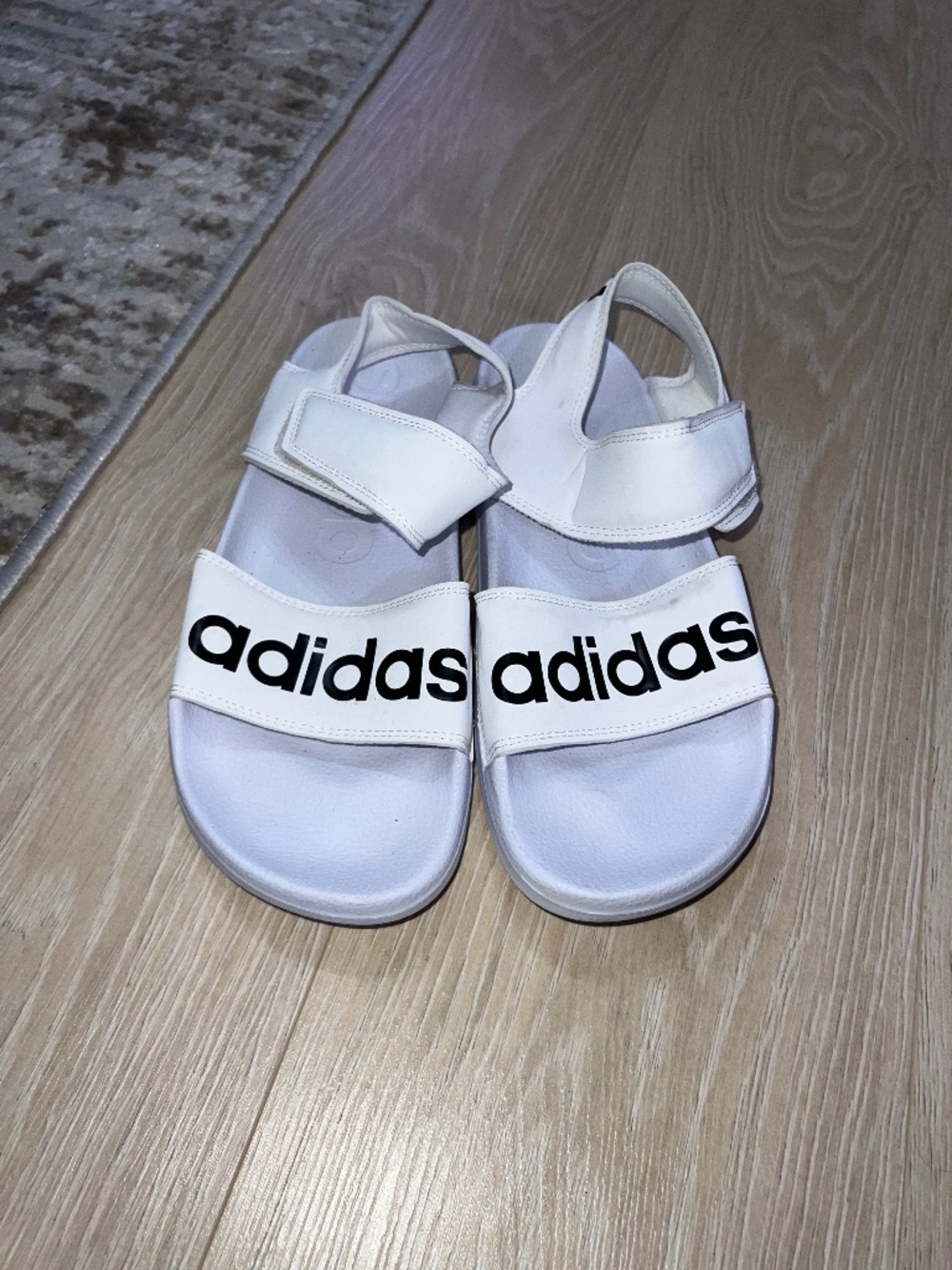 White with black adidas logo sandals 7
